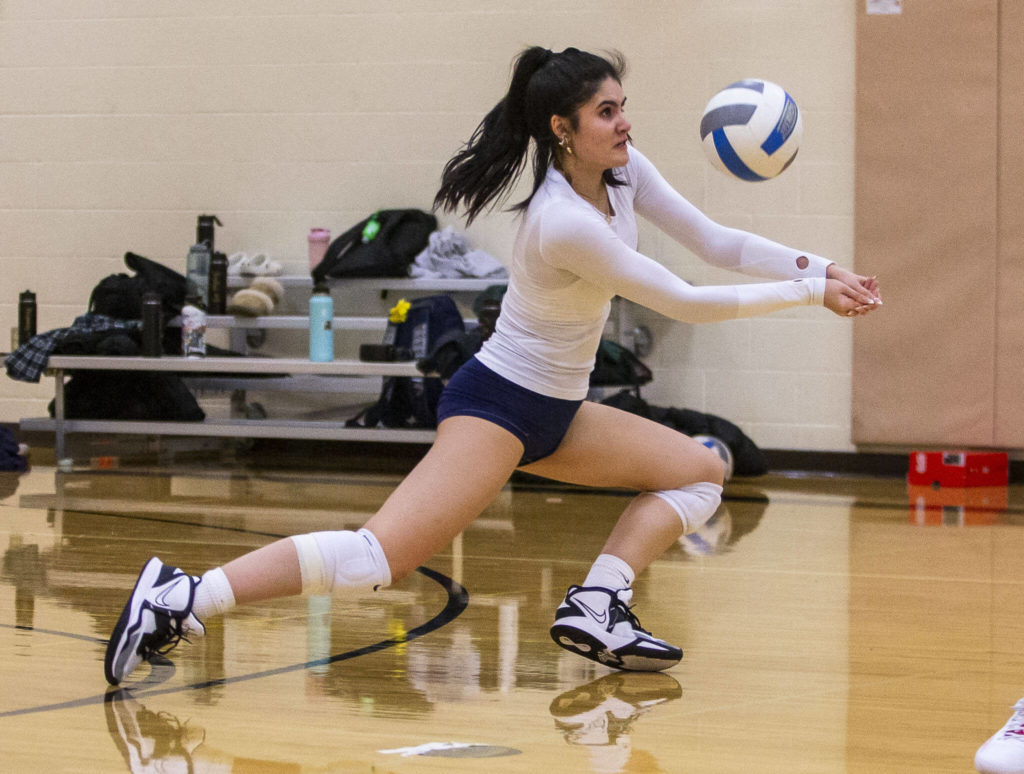 Paige Gessey digs the ball during practice on Tuesday, Nov. 15, 2022 in Bothell, Washington. (Olivia Vanni / The Herald)
