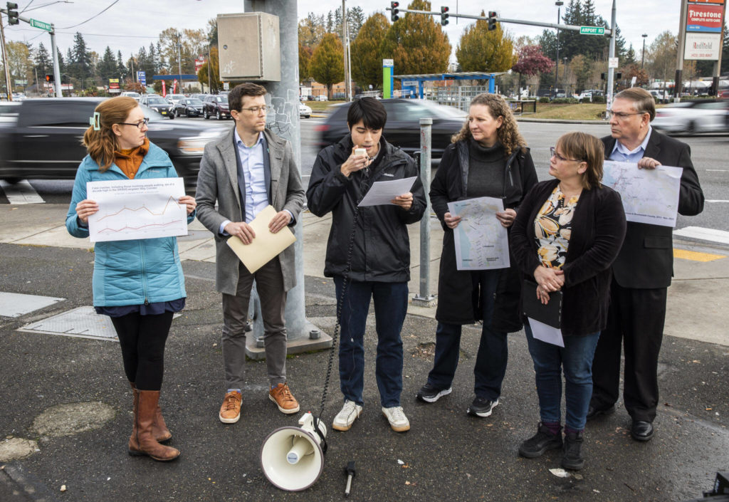 From left, Vicki Clarke, Brock Howell, Megan Dunn, Liz Vogeli and George Hurst listen while Ed Engel speaks during a press conference for World Day of Remembrance for Road Traffic Victims on Monday in Everett. (Olivia Vanni / The Herald)
