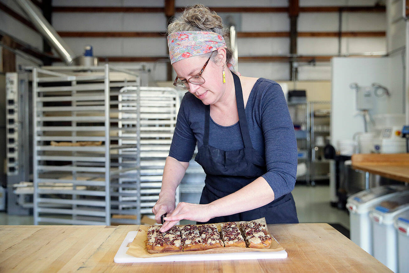 Rachael Grace Sobczak, owner of Water Tank Bakery, is sharing her recipe for Dulce de Leche Pumpkin Bars Burlington, Washington on October 10, 2022.  (Kevin Clark / The Herald)
