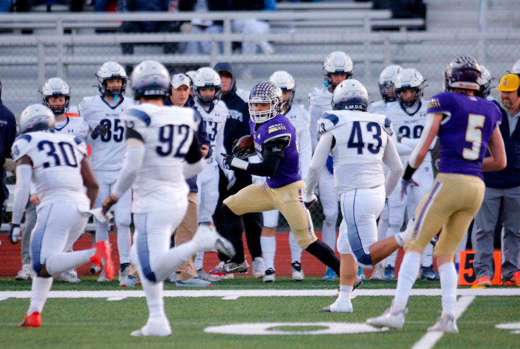 After another big night, Limar brought his season totals to 1,966 yards and 34 touchdowns. (Ryan Berry / The Herald)
