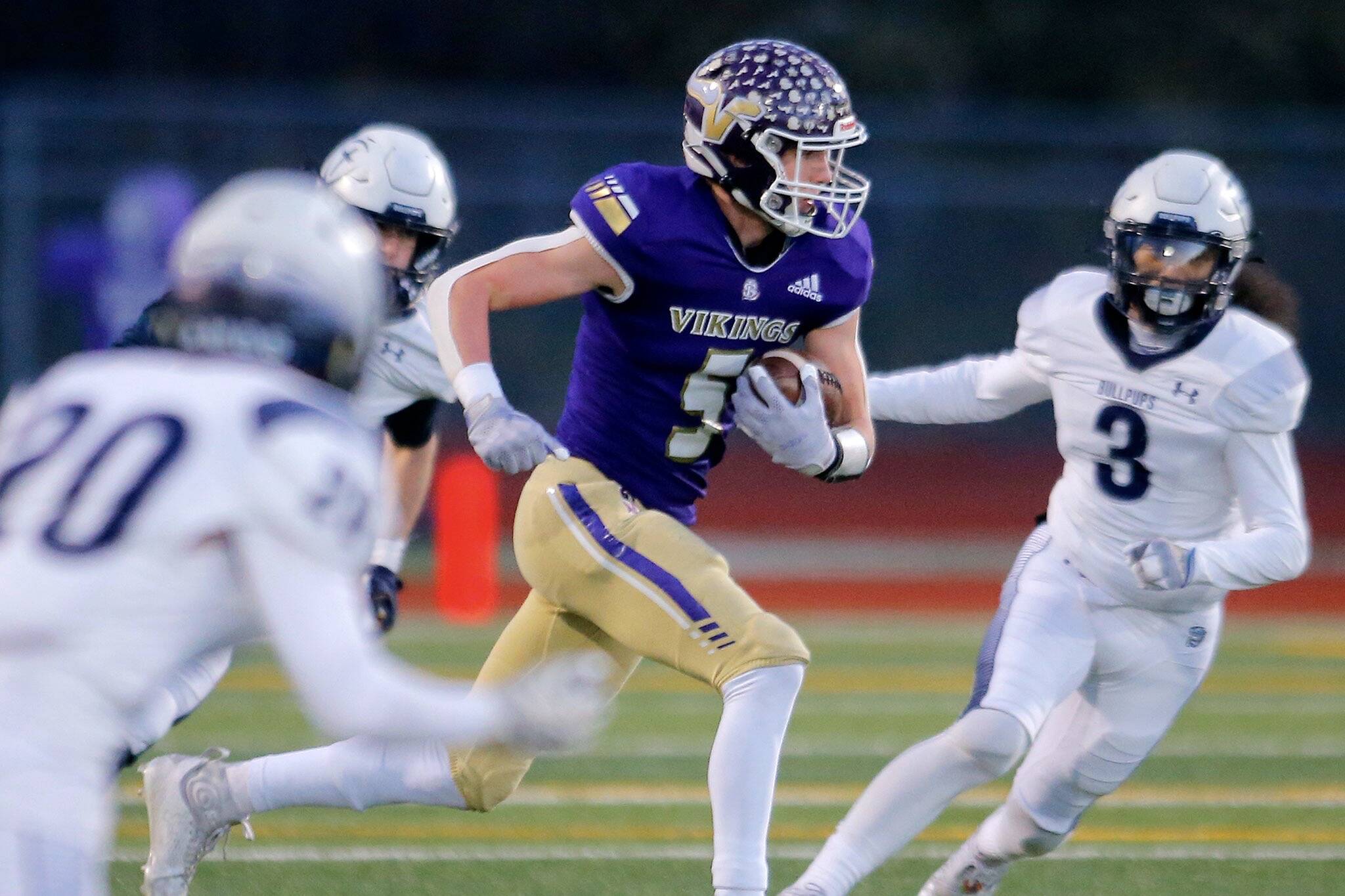 Lake Stevens’ Cole Becker weaves through the secondary on a long reception against Gonzaga Prep on Saturday, Nov. 19, 2022, at Lake Stevens High School in Lake Stevens, Washington. (Ryan Berry / The Herald)