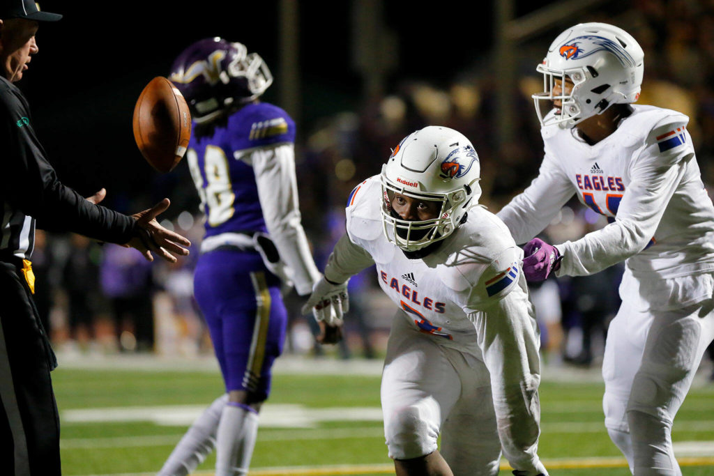 Graham-Kapowsin’s Jalen Davenport gets up to celebrate after rumbling to the end zone through multiple defenders during the 4A semifinal against Lake Stevens on Saturday, Nov. 26, 2022, at Lake Stevens High School in Lake Stevens, Washington. (Ryan Berry / The Herald)
