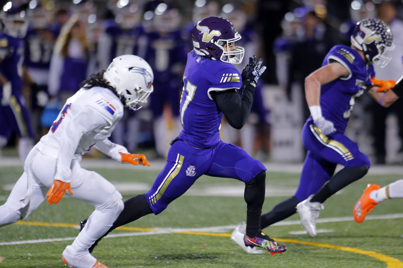 Lake Stevens’ Jayden Limar beats the defense for a 55-yard touchdown run during the 4A semifinal against Graham-Kapowsin on Saturday, Nov. 26, 2022, at Lake Stevens High School in Lake Stevens, Washington. (Ryan Berry / The Herald)