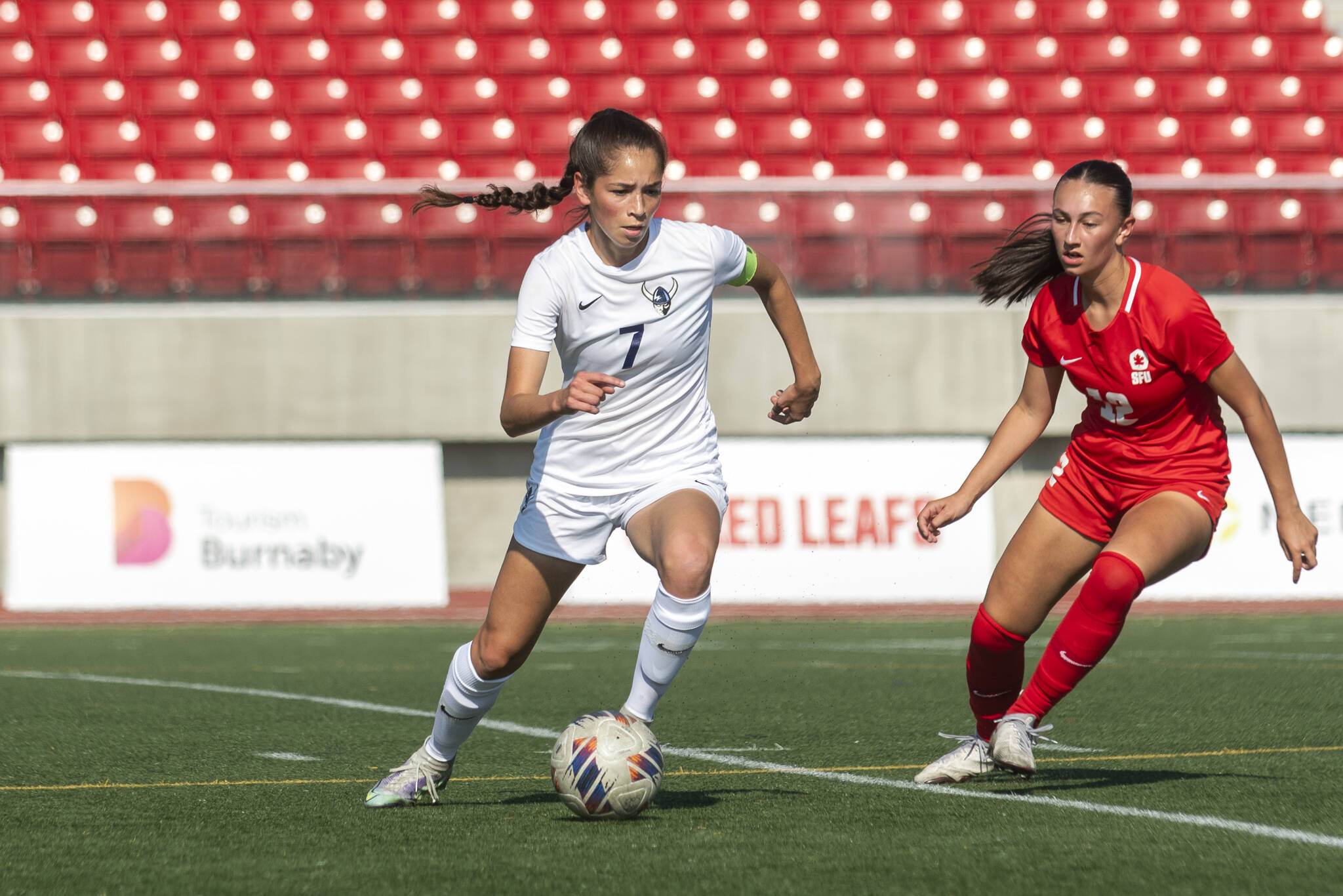 Western Washington’s Dayana Diaz (left), a Granite Falls High School graduate, dribbles the ball during a game against Simon Fraser on Oct. 8 in Burnaby, B.C. (Photo provided by WWU)