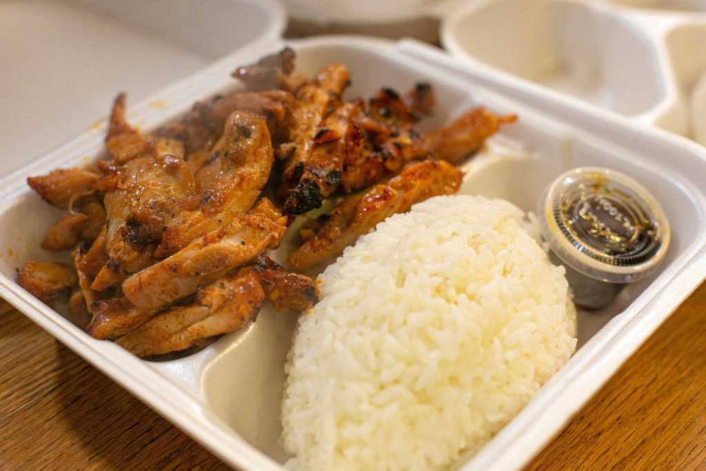 A meal is ready to go after being prepared at Toshi’s Teriyaki Grill in Mill Creek. (Ryan Berry / The Herald)
