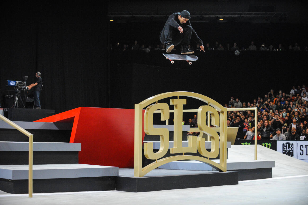 Brazilian skater Kelvin Hoefler jumps over the SLS sign during a Street League Skateboarding event. (Photo provided by SLS)