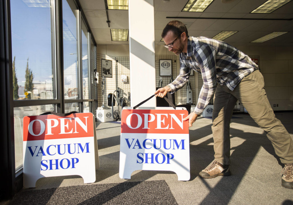 David Lane moves things around Everett Vacuum’s new shop on Hewitt Avenue in Everett. (Olivia Vanni / The Herald)
