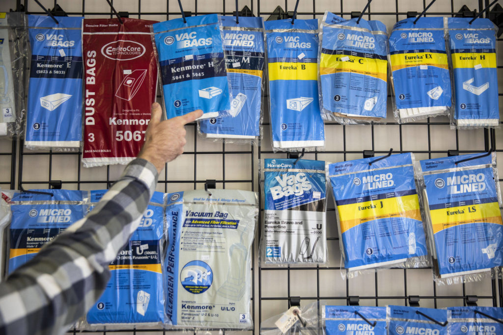 A wall of multiple vacuum bags available at Everett Vacuum’s new location. (Olivia Vanni / The Herald)
