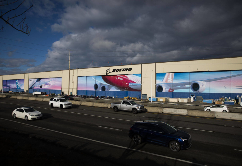 Traffic moves along Highway 526 in front of Boeing’s Everett Production Facility on Monday, Nov. 28, 2022 in Everett, Washington. (Olivia Vanni / The Herald)
