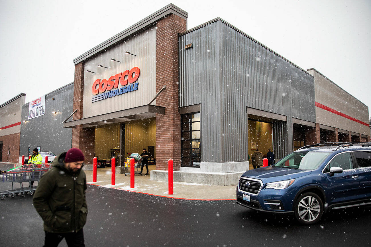 Customers enter and exit the new Costco on Friday, Dec. 2, 2022 in Lake Stevens, Washington. (Olivia Vanni / The Herald)