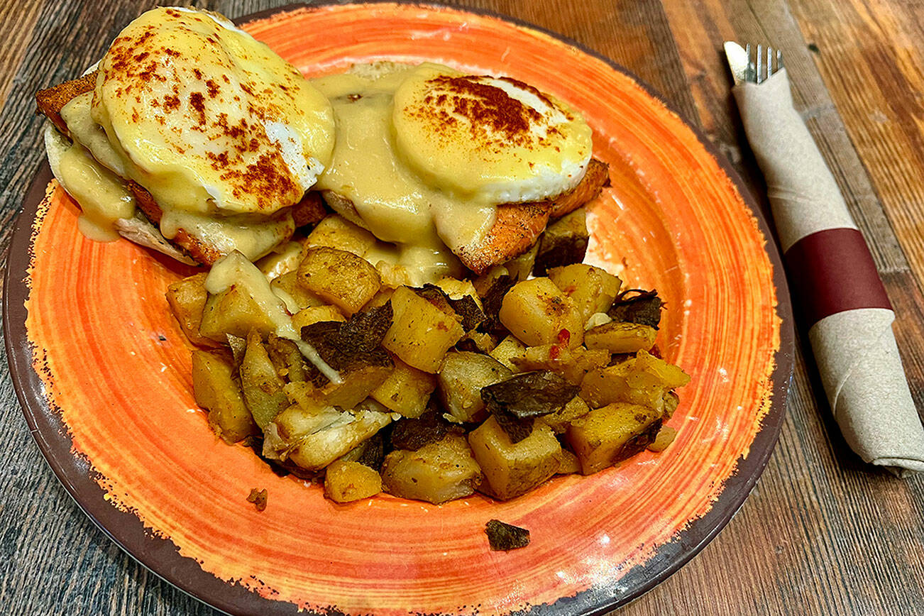 Salmon Eggs Benedict with a side of skillet potatoes, $16, at Quil Ceda Creek Casino in Tulalip, where breakfast with numerous menu choices is served 24/7. (Andrea Brown / The Herald)