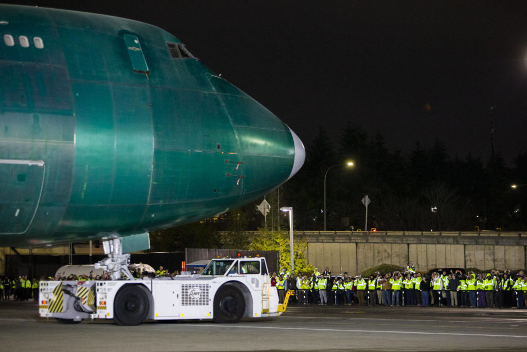 The final 747 is rolled out of the factory on Tuesday, in Everett. (Olivia Vanni / The Herald)
