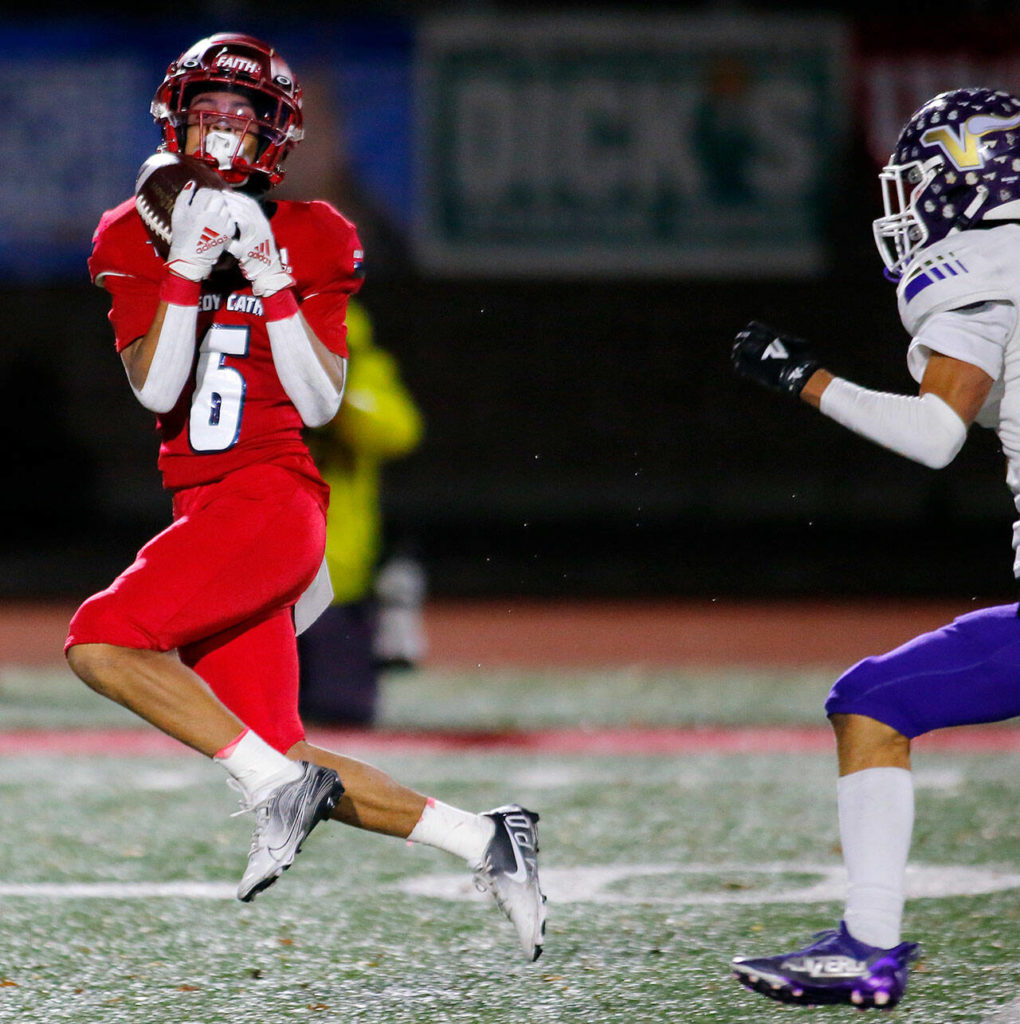 Kennedy Catholic’s Isaac Syph comes down with a long pass against Lake Stevens in the WIAA 4A State Football Championship game Saturday, Dec. 3, 2022, at Mount Tahoma Stadium in Tacoma, Washington. (Ryan Berry / The Herald)
