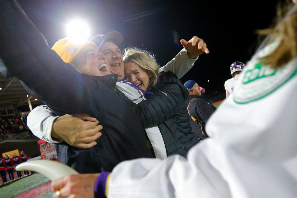 Lake Stevens head coach Tom Tri begins to celebrate his team’s victory over Kennedy Catholic in the WIAA 4A State Football Championship game Saturday, Dec. 3, 2022, at Mount Tahoma Stadium in Tacoma, Washington. (Ryan Berry / The Herald)

