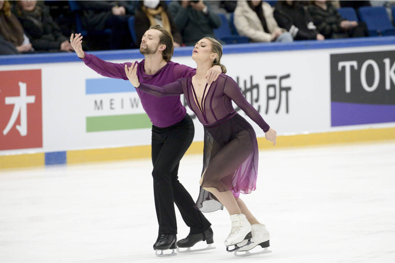 Kaitlin Hawayek and Jean-Luc Baker of USA perform during the ice dance free dance of the ISU figure skating Grand Prix Espoo 2022 competition in Espoo, Finland, Saturday, Nov. 26, 2022. Hawayek and Baker came second in the event.  (Mikko Stig/Lehtikuva via AP)