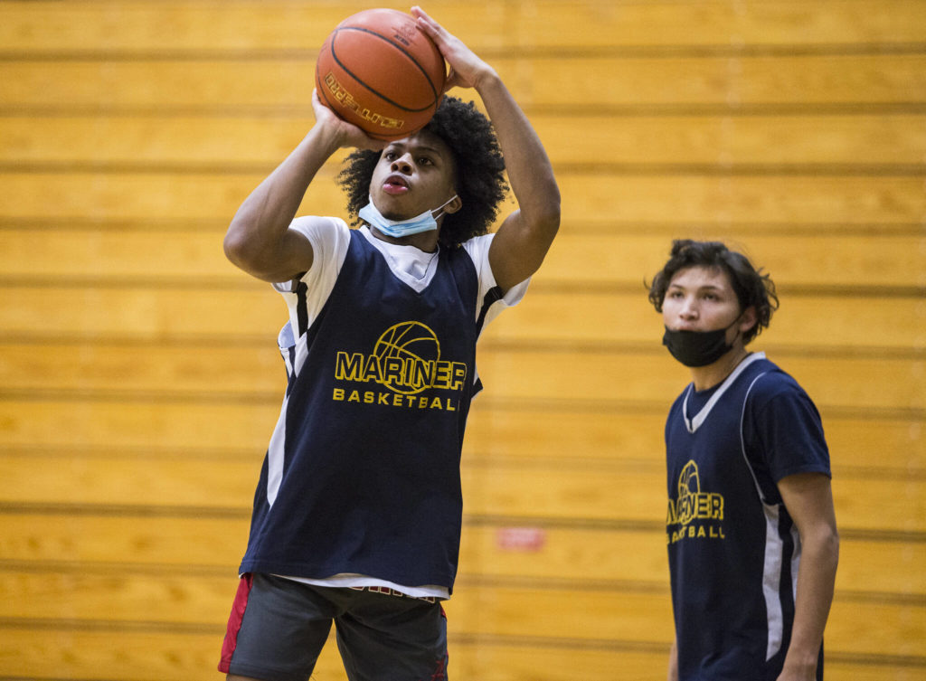 Jailin Johnson makes a 3-point shot during a Feb. 10 practice at Mariner High School in Everett. (Olivia Vanni / The Herald)
