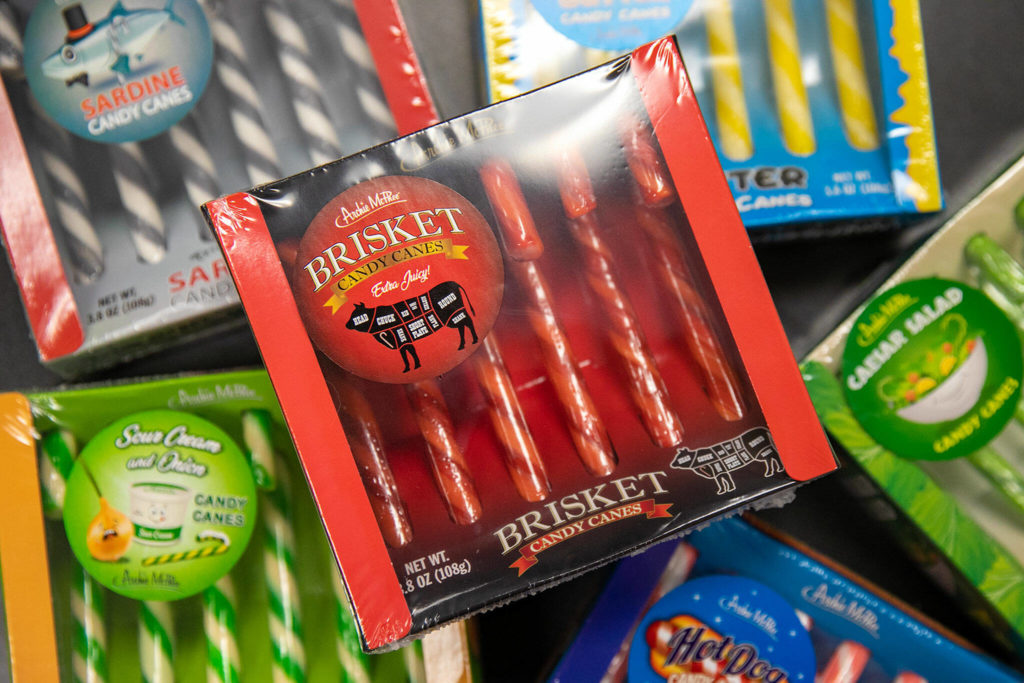 A number of different Archie McPhee candy cane flavors are available for the holiday season. (Ryan Berry / The Herald)
