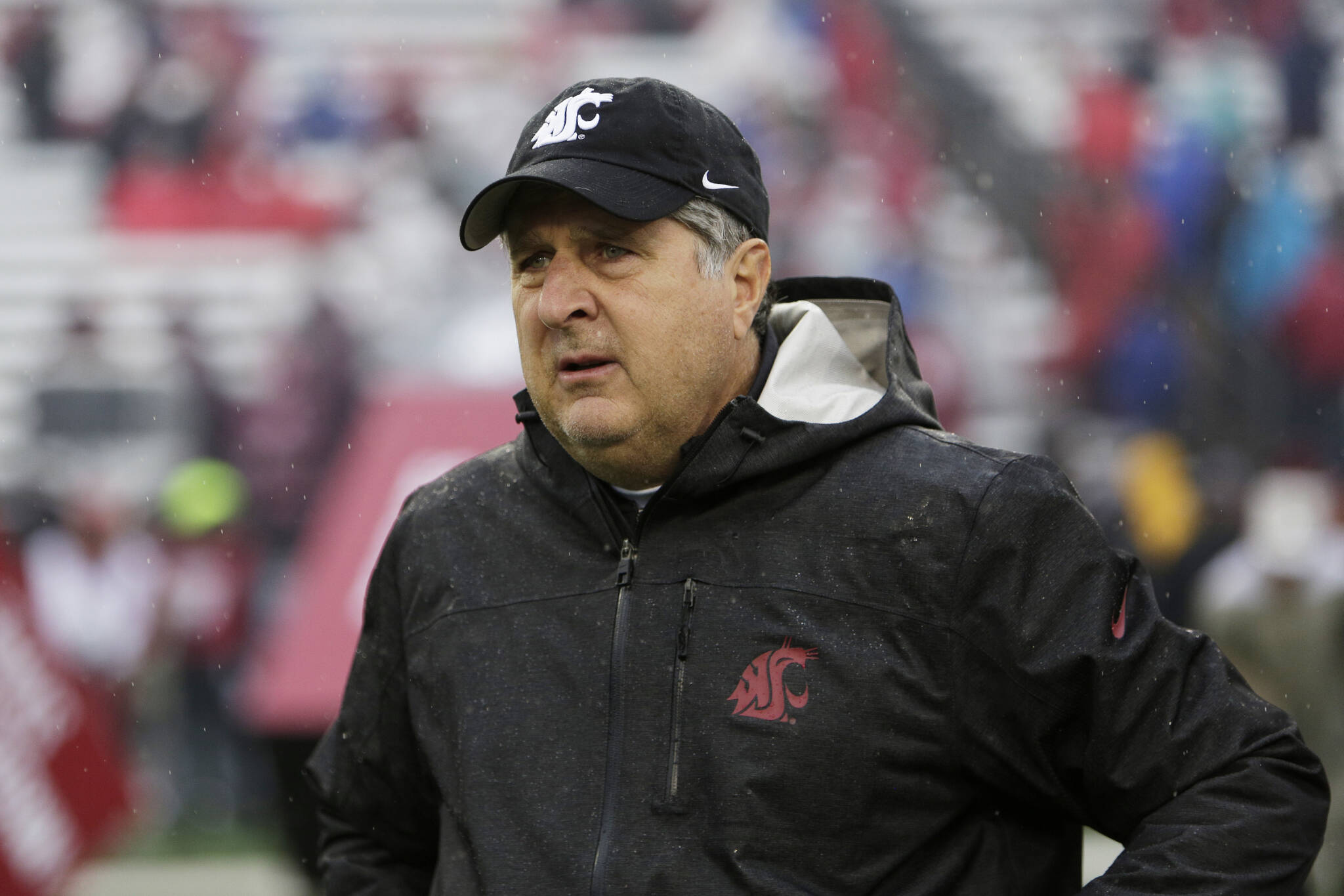 Ex-Washington State head coach Mike Leach walks onto the field before a game against Colorado on Oct. 19, 2019, in Pullman. (AP Photo/Young Kwak, File)