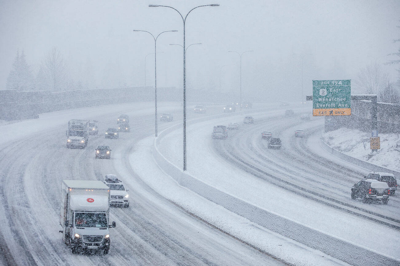 Traffics moves slowly along I-5 through Everett on Tuesday, Dec. 20, 2022 in Everett, Washington. (Olivia Vanni / The Herald)