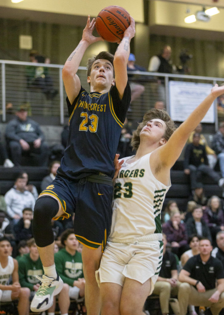 Shorecrest’s Parker Baumann drives to the hoop during the game against Marysville Getchell on Friday, Dec. 16, 2022 in Marysville, Washington. (Olivia Vanni / The Herald)
