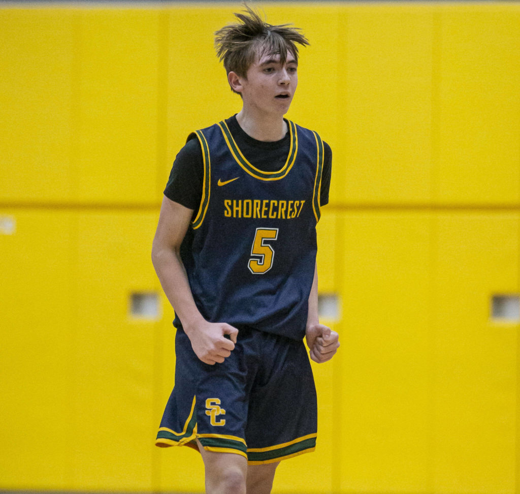 Shorecrest’s Brayden Fischer reacts to hitting a 3-point shot during the game against Marysville Getchell on Friday, Dec. 16, 2022 in Marysville, Washington. (Olivia Vanni / The Herald)
