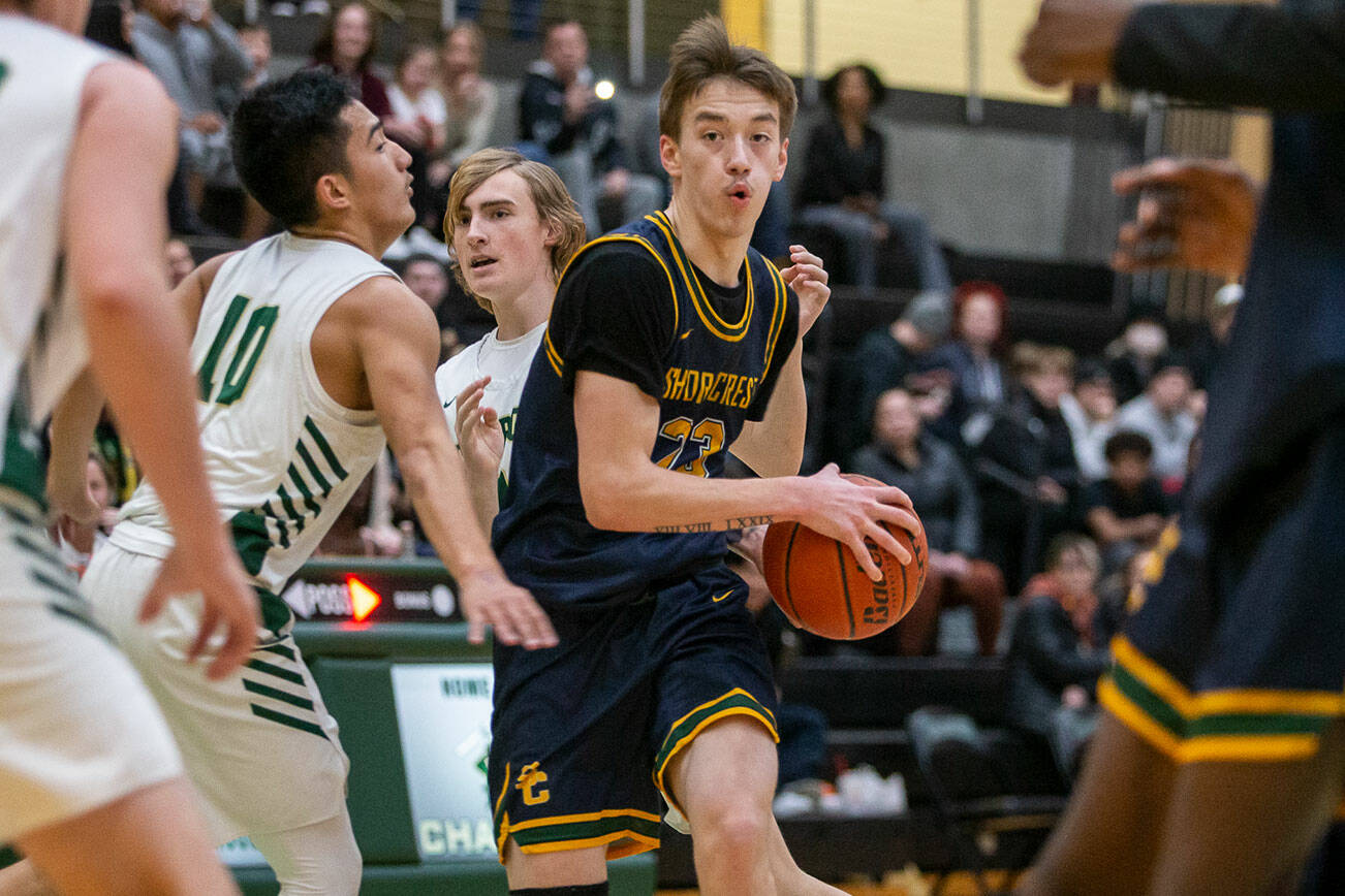 Shorecrest’s Parker Baumann drives to the hoop during the game against Marysville-Getchell on Friday, Dec. 16, 2022 in Maryville, Washington. (Olivia Vanni / The Herald)