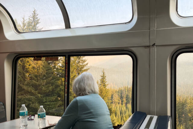 Back in the observation car checking out the views near Blue River, Oregon. (Julia Carmel / Los Angeles Times)