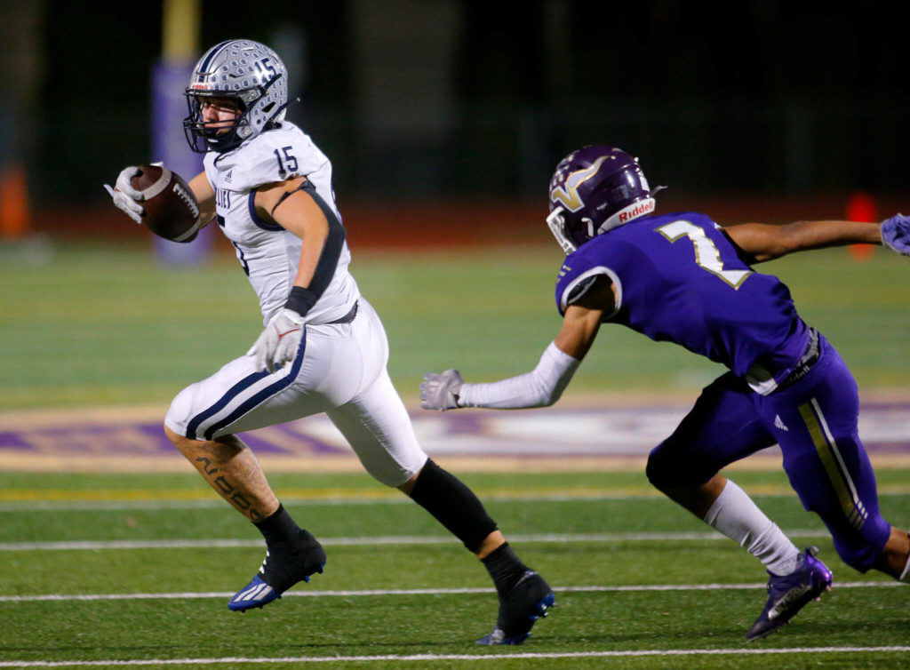 Washington State-bound athlete Trey Leckner (left) was one of three Glacier Peak seniors who signed with FBS programs. (Ryan Berry / The Herald)
