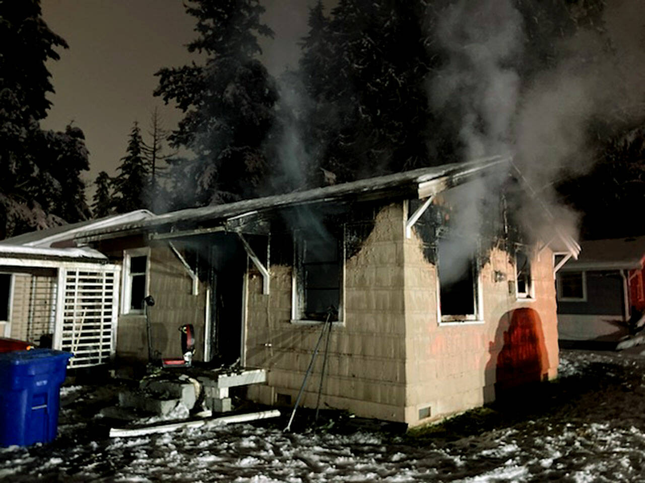 A woman was seriously injured in a house fire Tuesday night in Lynnwood. (South County Fire)