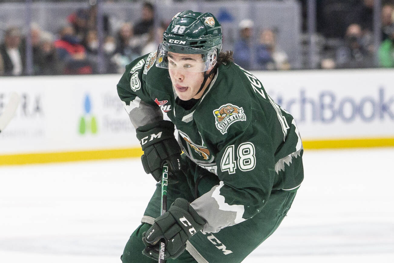 Everett Silvertips’ Olen Zellweger breaks away with the puck during the game against the Seattle Thunderbirds at Climate Pledge Arena on Saturday, Feb. 26, 2022 in Seattle, Washington. (Olivia Vanni / The Herald)