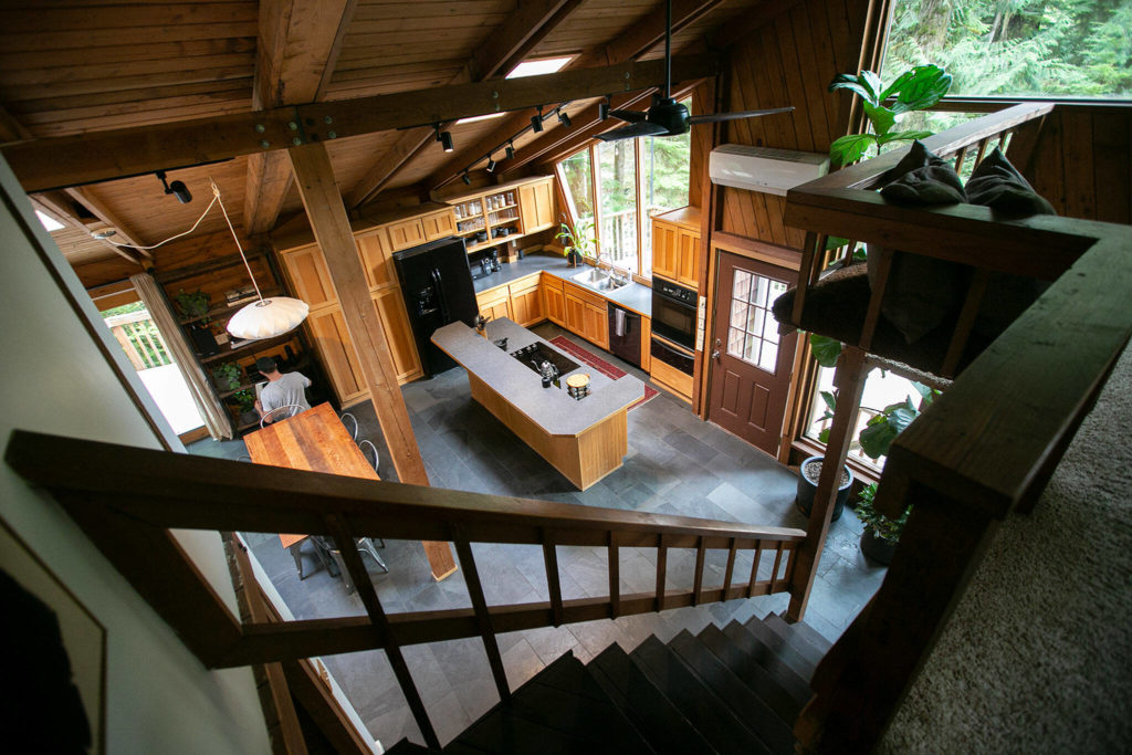 The view down from the bedroom in Cabin 1 looks down into the kitchen. (Ryan Berry / The Herald)
