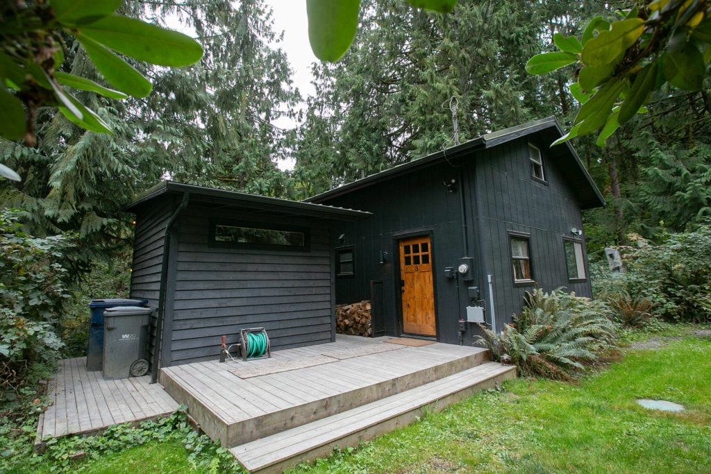 Cabin 3 faces the road at Canyon Creek Cabins on Sep. 23, in Granite Falls. (Ryan Berry / The Herald) 
