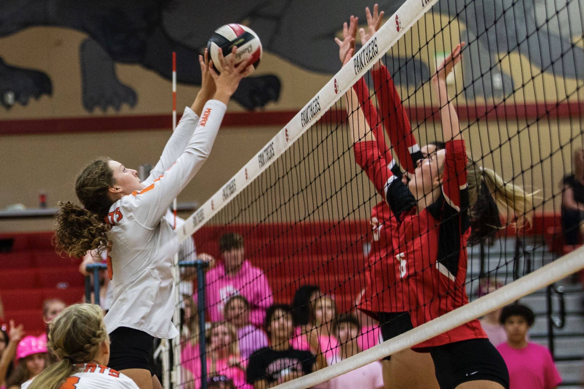 Monroe’s Jessi Mahler sets the ball over the net during the match against Snohomish on Tuesday, Sept. 27, 2022 in Snohomish, Washington. (Olivia Vanni / The Herald)