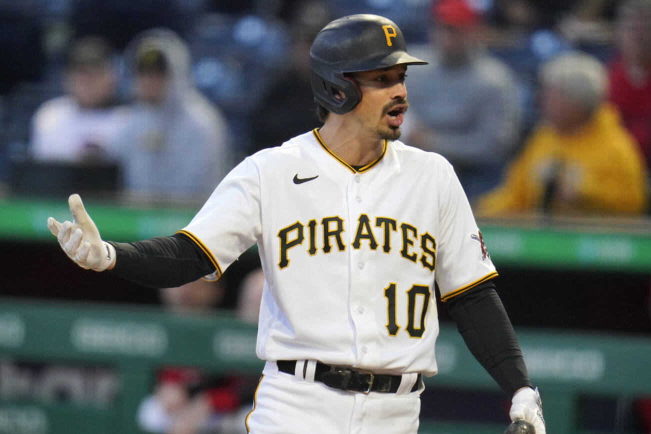 FILE - Pittsburgh Pirates' Bryan Reynolds disagrees with a called third strike during the first inning of a baseball game against the Cincinnati Reds in Pittsburgh, on Sept. 27, 2022. Reynolds has requested a trade ahead of baseball's winter meetings. (AP Photo/Gene J. Puskar, File)