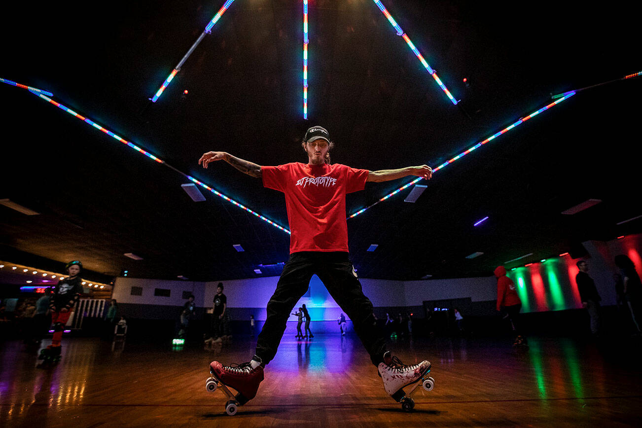 Joseph Cordell, a long time patron of the Everett Skate Deck, demonstrates some of his skate moves during the final open skate session at the Everett Skate Deck before it’s permanent closure on Sunday, April 3, 2022. (Olivia Vanni / The Herald)