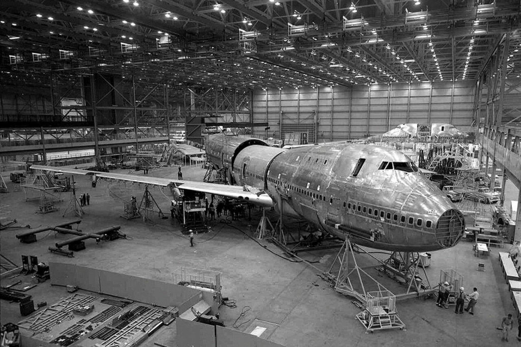 Boeing decides to build the 747 plant in Everett in 1966. At the Boeing Co.’s Everett factory, workers assemble the main body pieces of the original 747 in May 1968. A month later, the company would begin testing the engine that Pratt & Whitney developed for the 747 on a B-52. (Photo Courtesy of The Boeing Co.)
