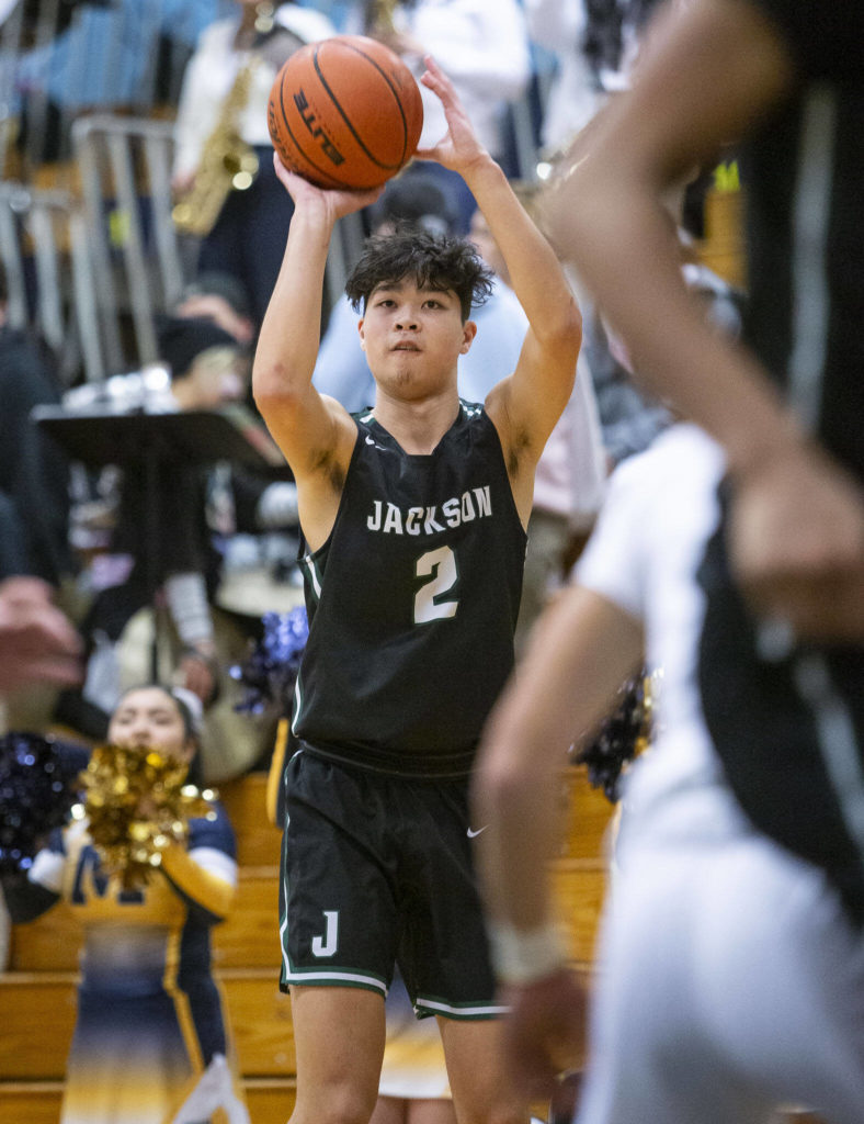 Jackson’s Harris Kampe makes a 3-point shot during the game against Mariner on Wednesday in Everett. (Olivia Vanni / The Herald)
