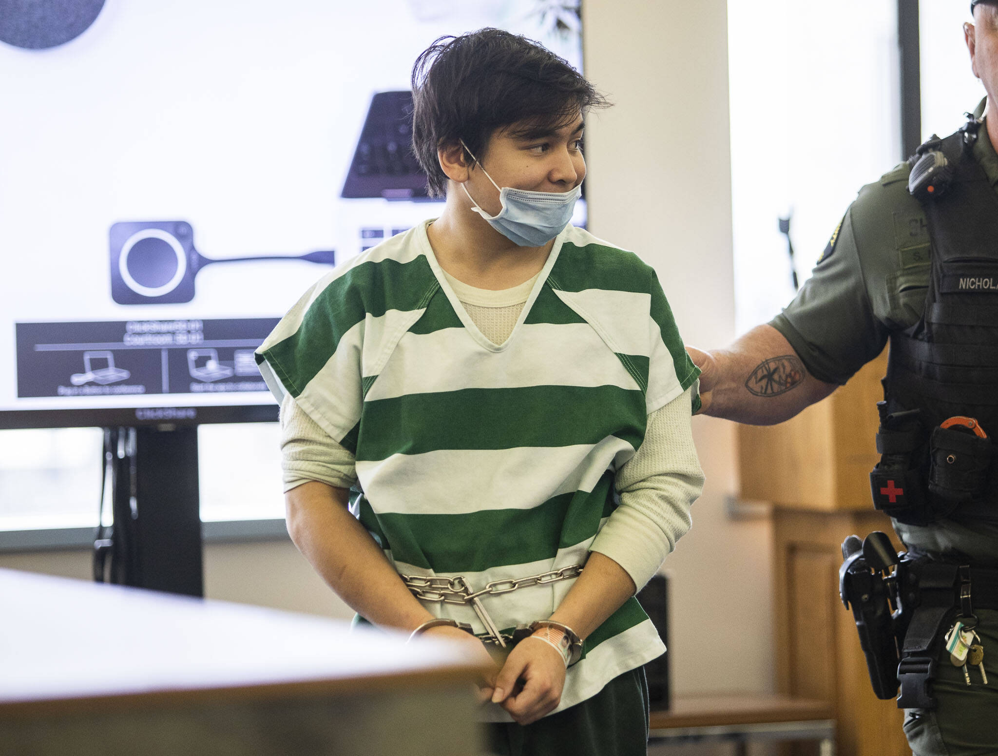 Cameron Stone is lead out of the courtroom after his sentencing at the Snohomish County Courthouse on Jan. 6, in Everett. (Olivia Vanni / The Herald)