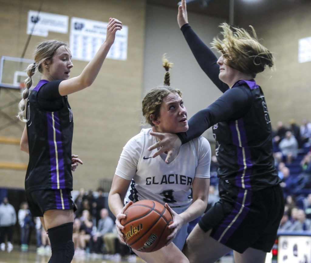 Glacier Peak’s Brynna Pukis (3) looks to shoot during a game between the Lake Stevens Vikings and Glacier Peak Grizzlies on Friday in Snohomish. The Grizzlies won 51-32. (Annie Barker / The Herald) (Annie Barker / The Herald)
