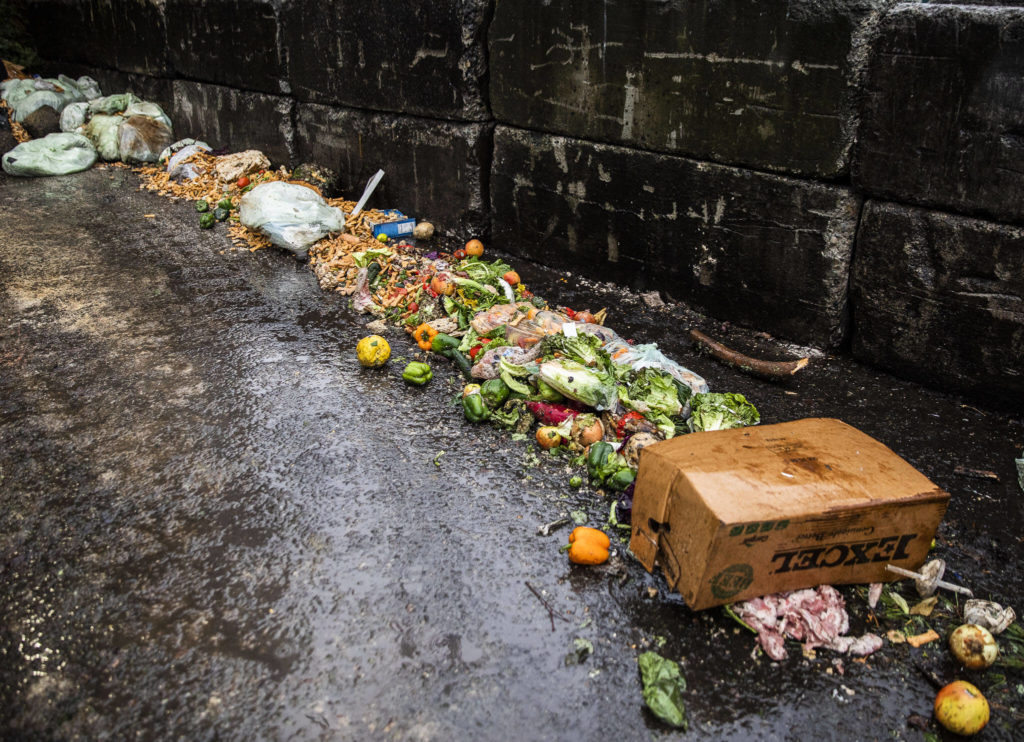 Food waste lines the edge of the tipping building at Cedar Grove Composting on Thursday, Jan. 12, 2023 in Everett, Washington. (Olivia Vanni / The Herald)
