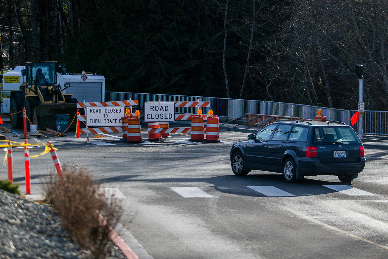Traffic from Costco turns left onto 24th Street SE past a closed South Lake Stevens Road on Tuesday, Jan. 10, 2023 in Lake Stevens, Washington. (Olivia Vanni / The Herald)