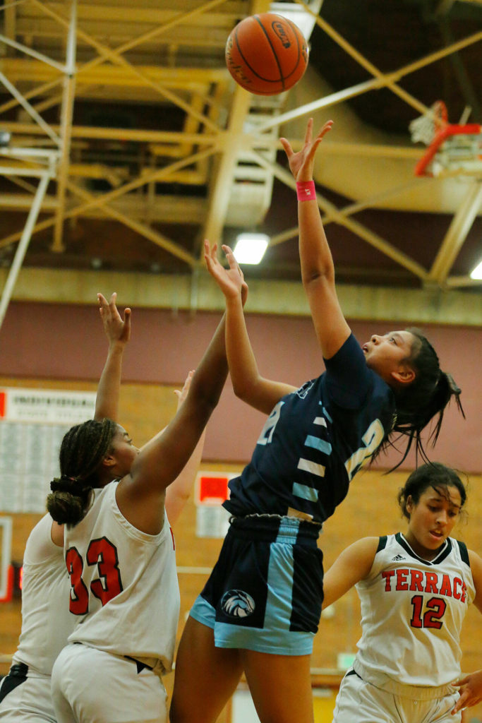 Meadowdale’s Samantha Medina hits a tough spinning shot against Mountlake Terrace on Wednesday, Jan.11, 2023, at Mountlake Terrace High School in Mountlake Terrace, Washington. (Ryan Berry / The Herald)
