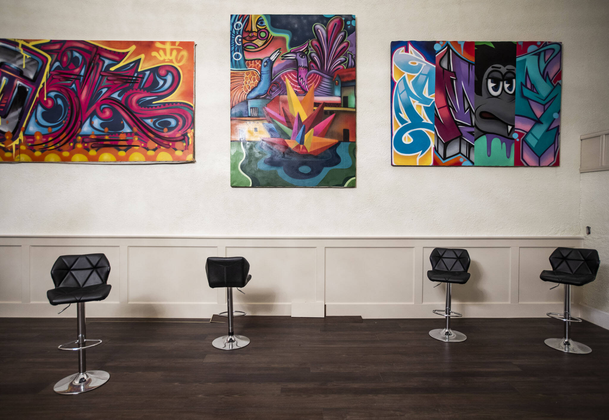 Art hangs on the wall inside of the event spaces at Kings Hall on Jan. 17, in Everett. (Olivia Vanni / The Herald)