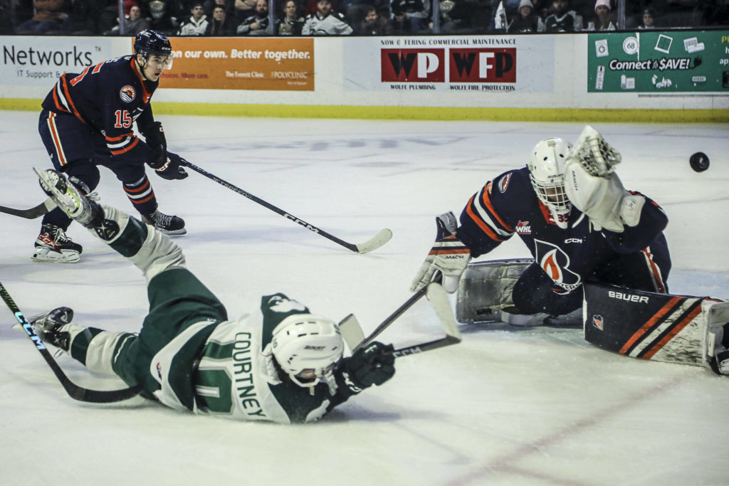 Silvertips’ Beau Courtney (10) sends the puck during a game between the Silvertips and Kamloops Blazers at the Angel of the Winds Arena on Friday, Jan. 13, 2023. The Silvertips fell to the Kamloops, 3-6. (Annie Barker / The Herald)
