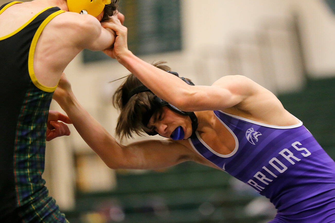 Edmonds-Woodway’s Jude Haines tries to pull down Shorecrest’s Neta Navot on Wednesday, Jan. 18, 2023, at Shorecrest High School in Shoreline, Washington. (Ryan Berry / The Herald)