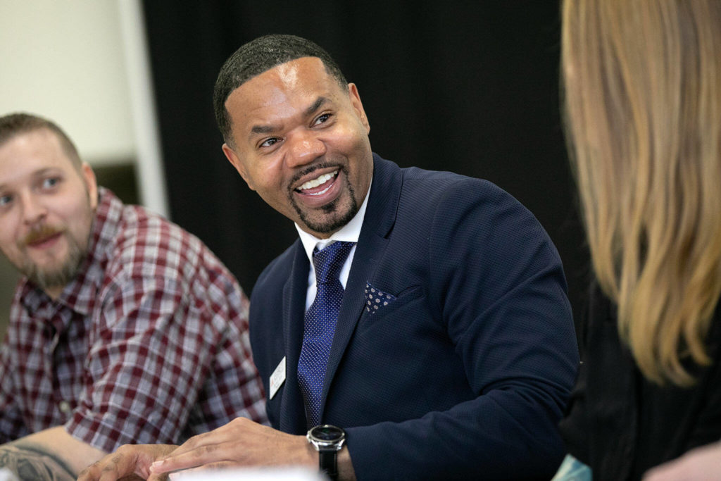 Dr. Darrell Cain, Interim President of Everett Community College, helps lead a roundtable meeting to discuss access to higher education and Pell Grant increases Thursday, Jan. 19, 2023, at Everett Community College in Everett, Washington. (Ryan Berry / The Herald)
