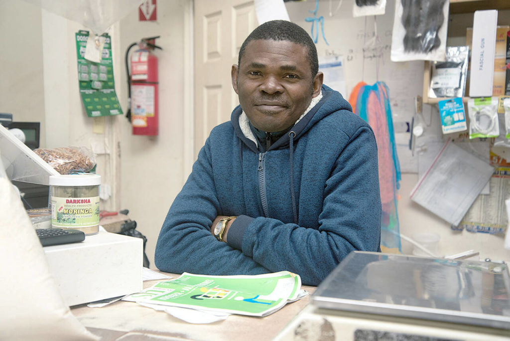 Moses Ufomba is the owner of Royal African and Caribbean Foods in the Bronx, New York. (Mitch Dao / YES! Media)
