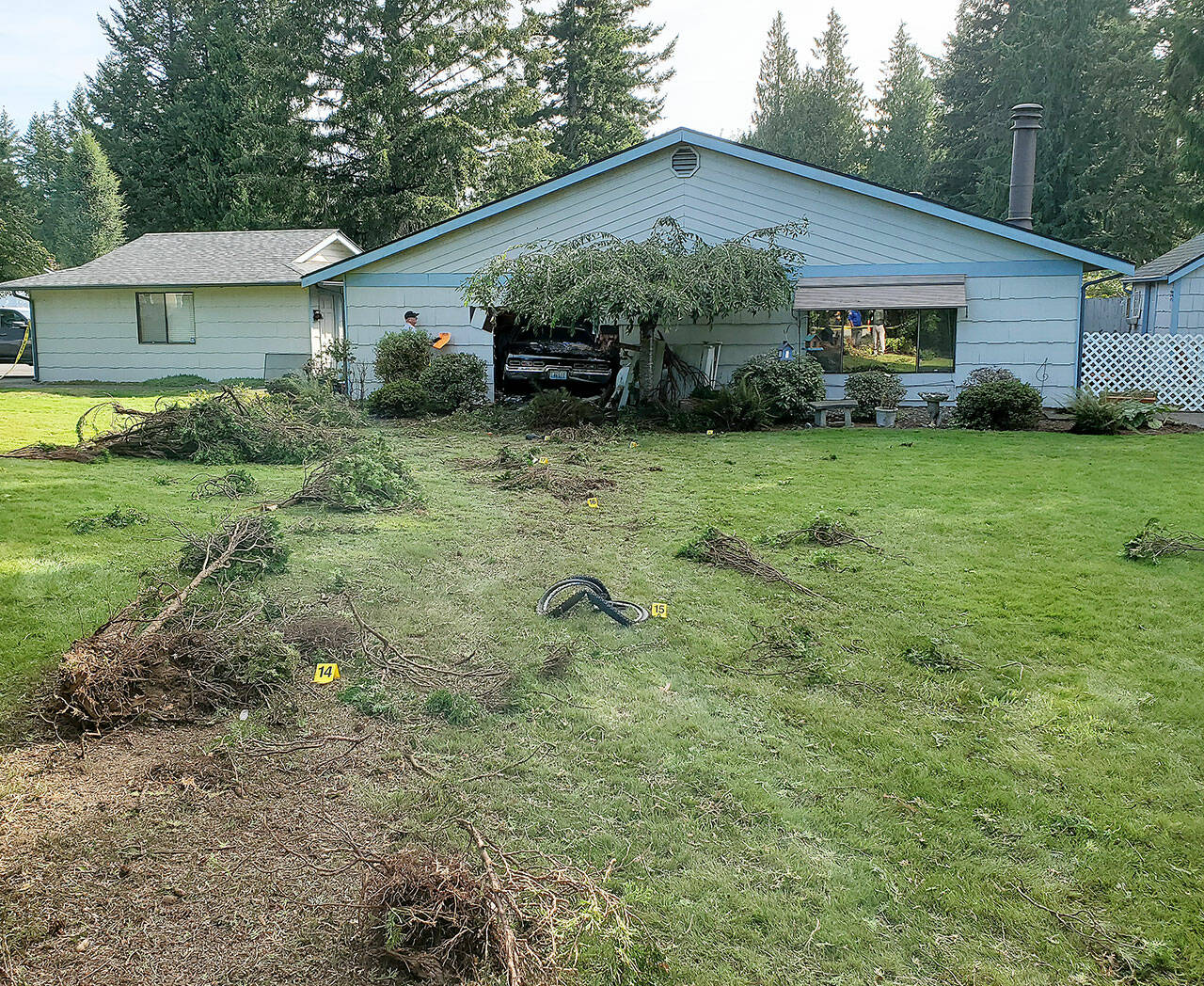 An alleged drunken driver, being pursued by police, hit a bicyclist and crashed into a Marysville home, killing a 97-year-old woman in late August of 2020, prior to a law going into effect that now limits when police can pursue motorists. (Marysville Police Department / Herald file)