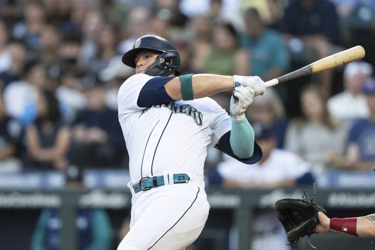 Seattle Mariners' Ty France takes a swing during an at-bat in a baseball game against the Chicago White Sox, Tuesday, Sept. 6, 2022, in Seattle. The Mariners won 3-0. (AP Photo/Stephen Brashear)