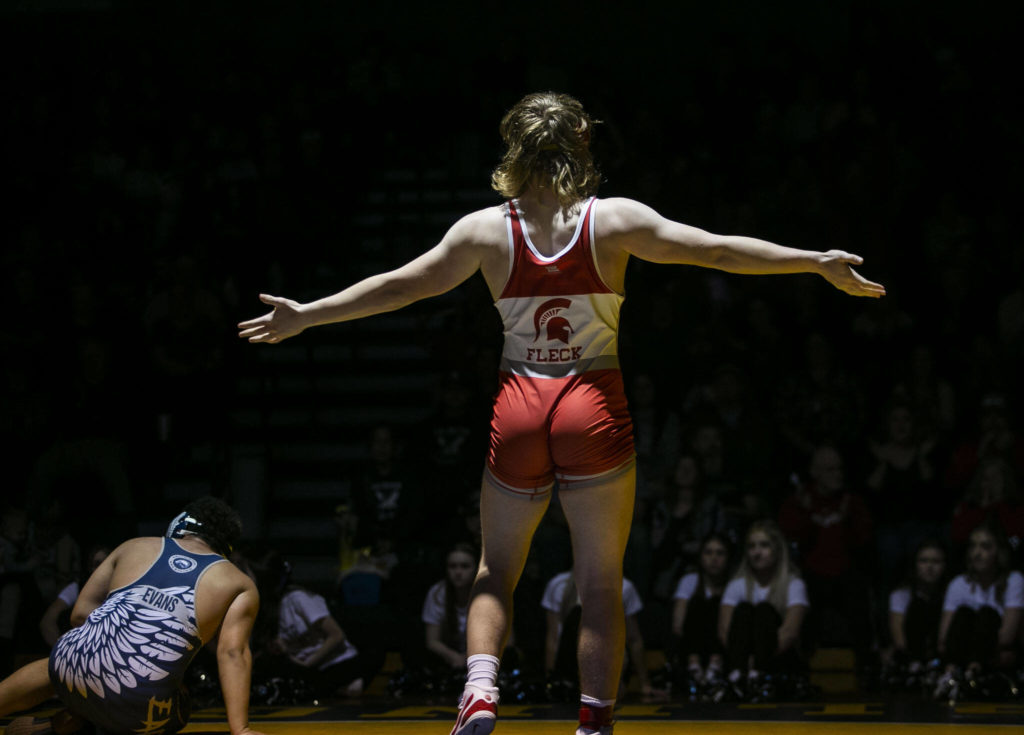 Arlington’s Elijah Fleck reacts to beating Arlington’s Isaiah Evans in the 220 pound weight class match on Tuesday, Jan. 24, 2023 in Arlington, Washington. (Olivia Vanni / The Herald)
